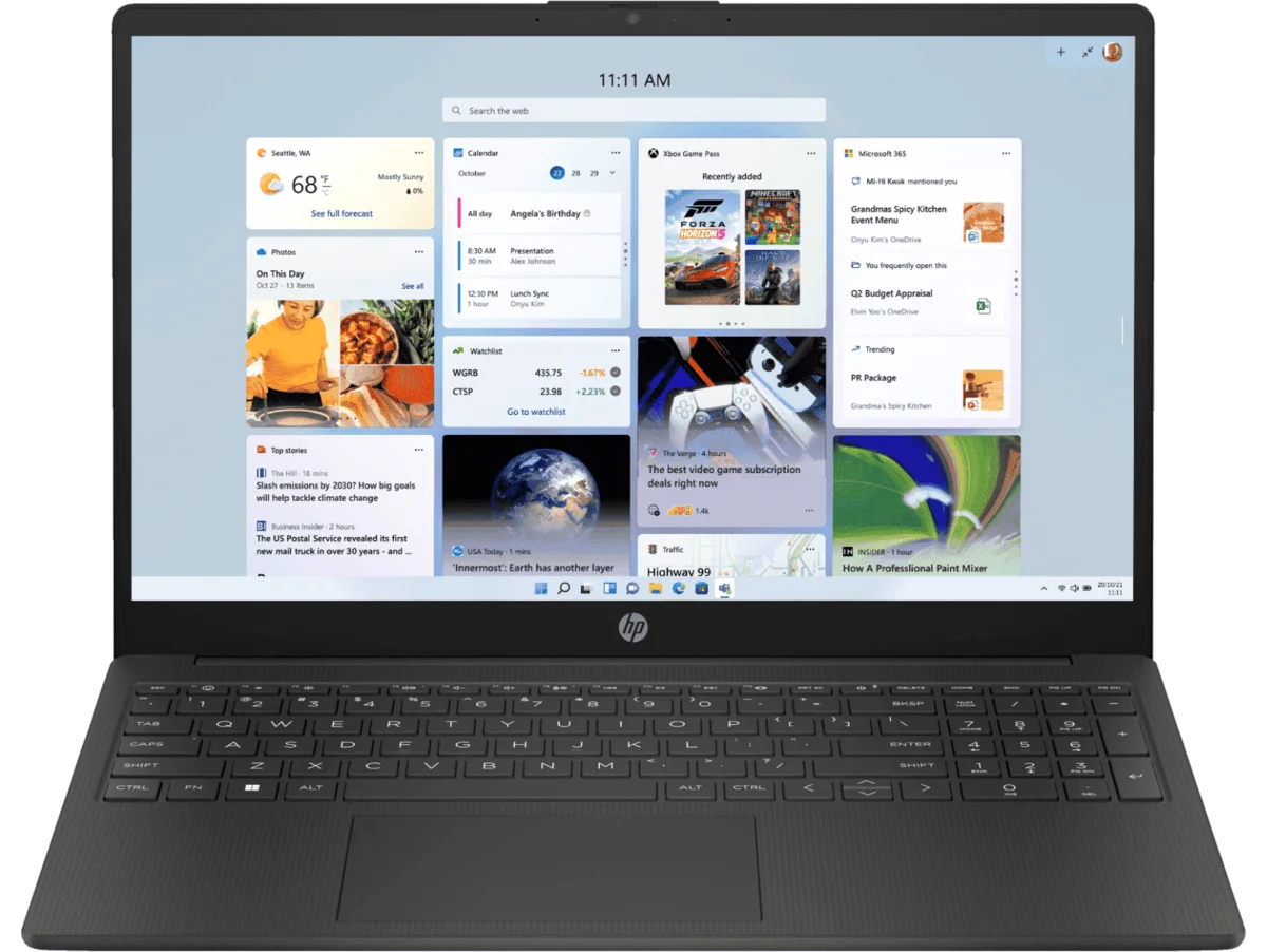HP 15.6 inch laptop in black, screen showing everyday app tiles