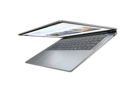 Silver HP laptop angled open on the bench